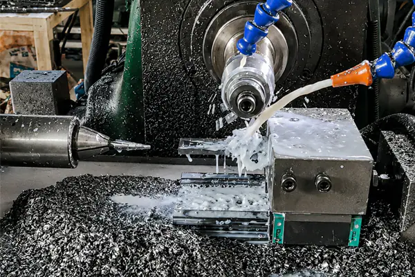 Step drill bit flute grinding