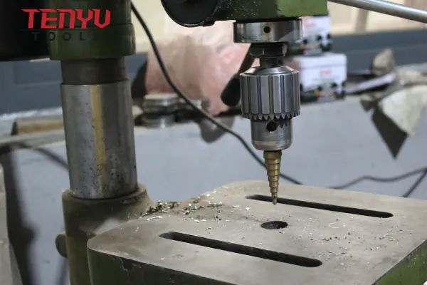 Step drill bit for panel holes