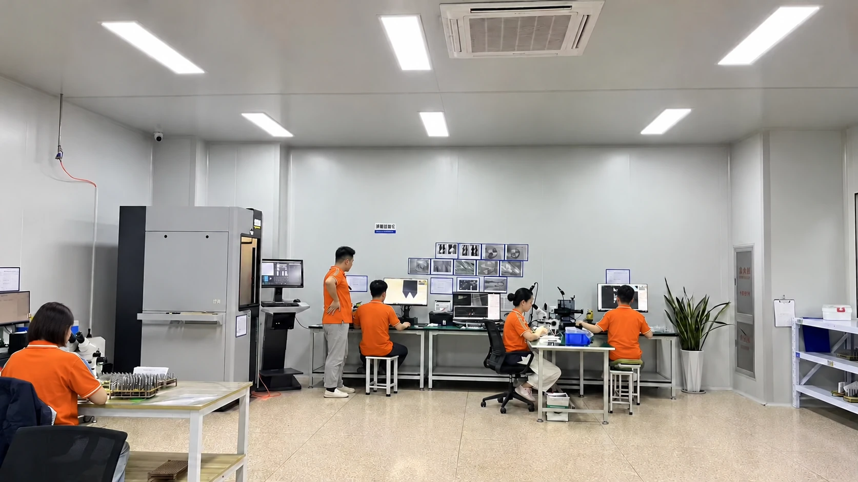 Operators working at optical inspection and tool-measuring stations — reference image for Long Shank Corner Radius End Mills