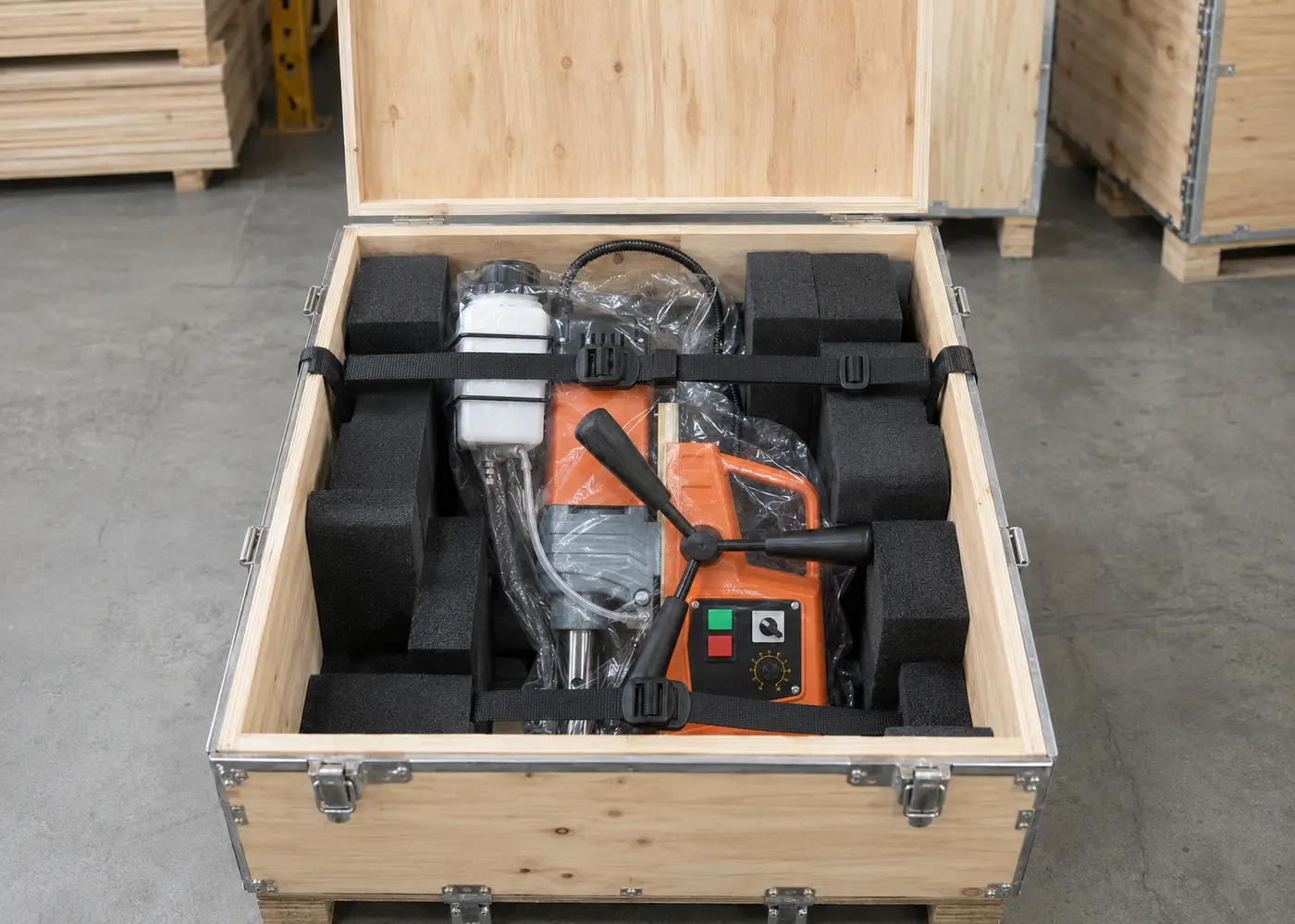 AX8840 magnetic drill secured inside a plywood shipping case