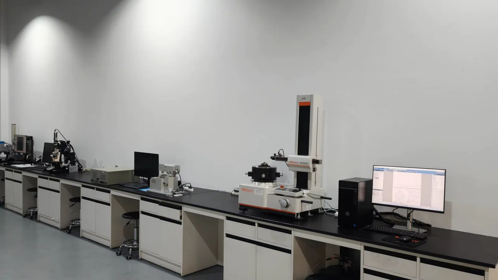 Metrology laboratory with measurement equipment in the supplied factory library