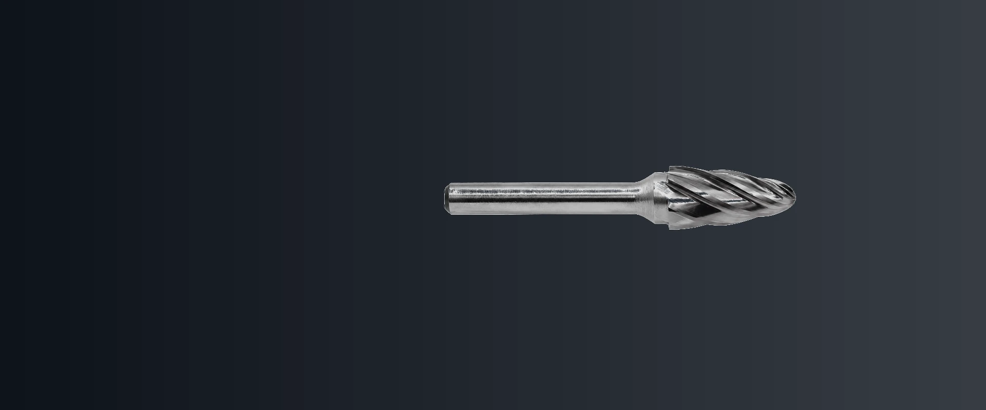 Single-cut carbide burr with one-direction spiral flutes