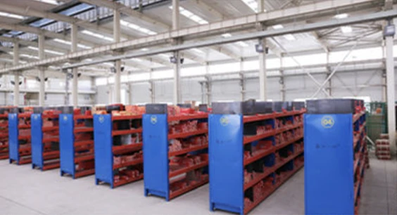 Storage racks and machine area in the threading-tool workshop