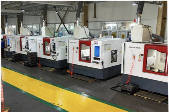 Workstations along the aisle in the threading-tool workshop